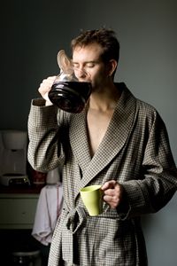 Picture of man drinking coffee.
